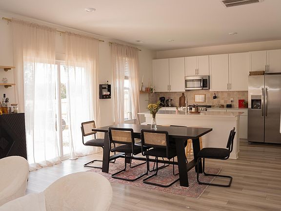 Kitchen opening to living/family room