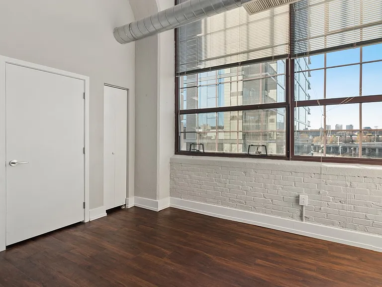 Loft-style homes with wood flooring throughout