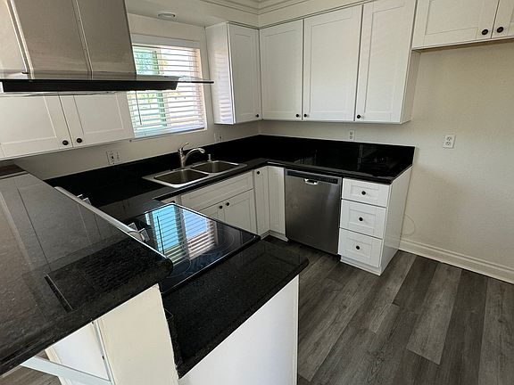 NICW WINDOW OVER SINK, MODERN VENTILATING FAN. ABUNDANT CUPBOARD SPACE, BRING IN YOUR OWN REFRIGERATOR.