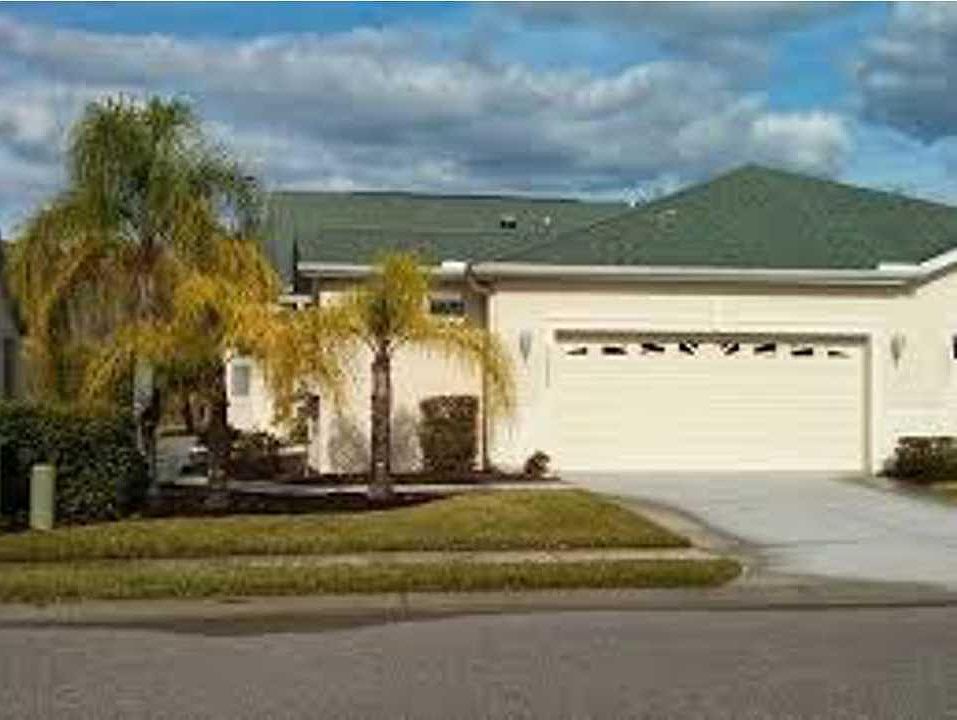 Front View - 2 Car Garage and Golf Cart /Storage area