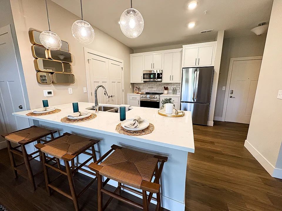 Modern White Kitchen with Stainless Steel Appliances