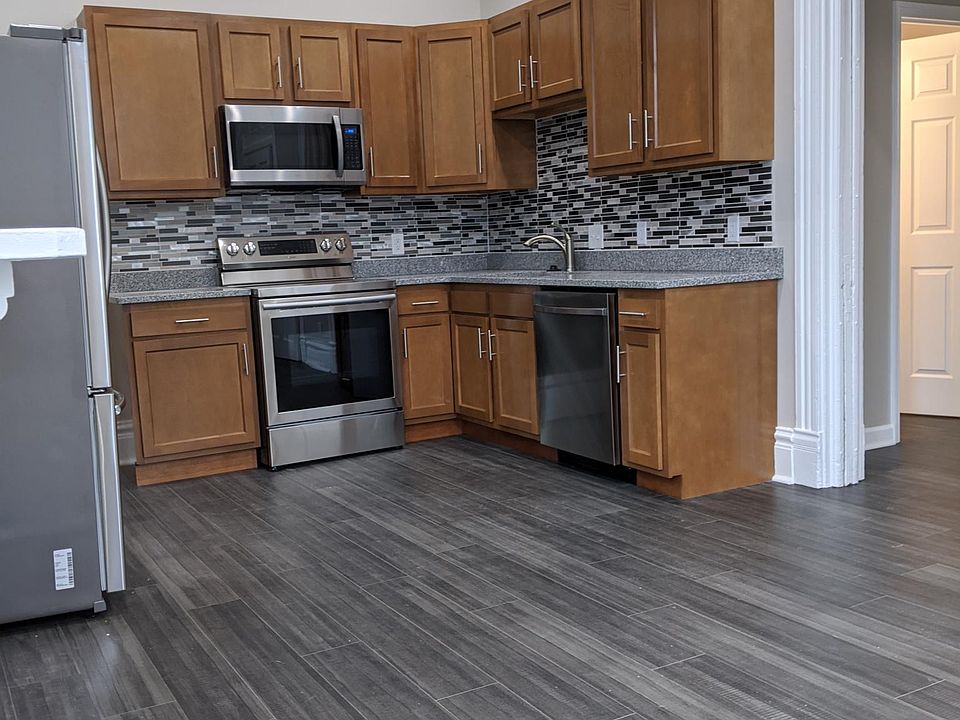 This kitchen is HUGE. Stainless steel appliances!