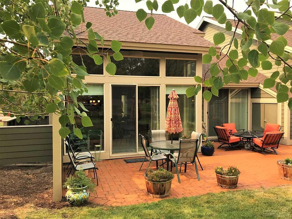 Back entry with patio and BBQ