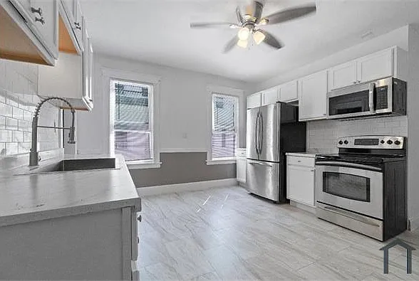 64 Rowe Ave — Photo 1