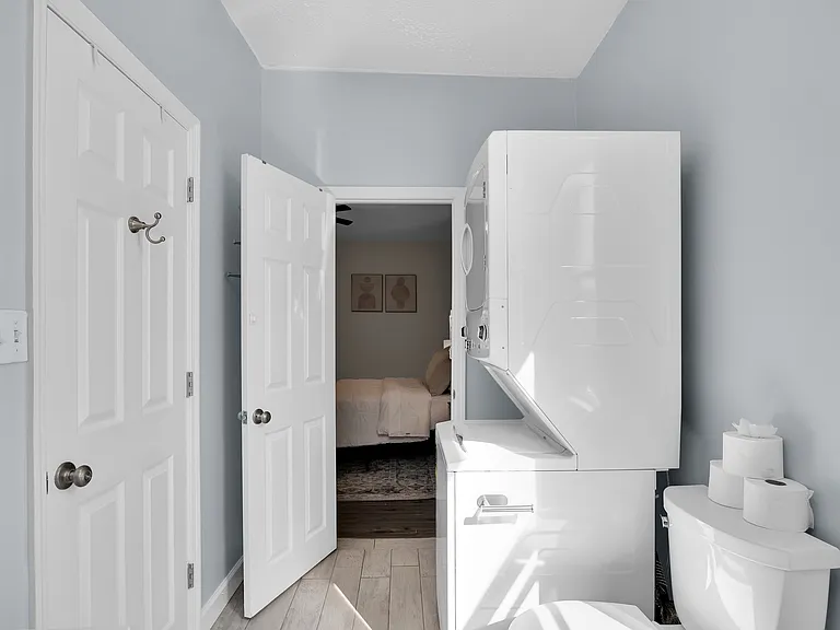 In-unit laundry and workspace for remote professionals.