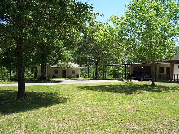 second home (1200 s.f.) with 36x24 insulated garage on slab