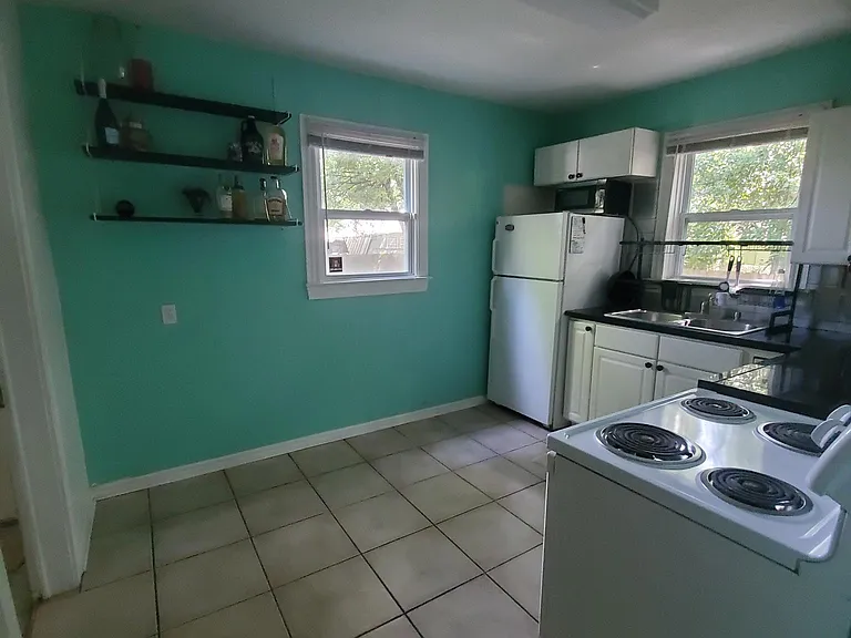 Laundry room to the left
