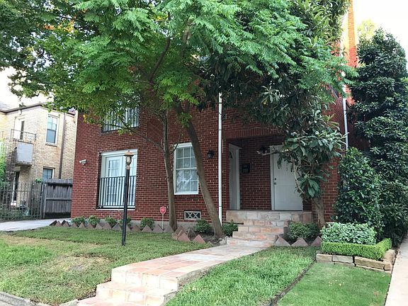 Outside the building completely remodeled. New back-yard con