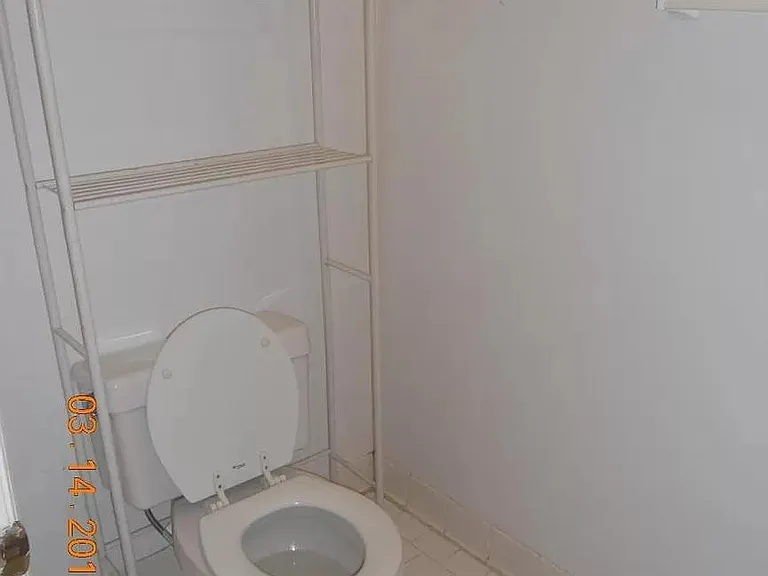 master bedroom with full bath and laundry