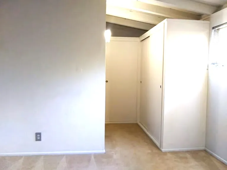 Small Hallway in Room with 2 Closets