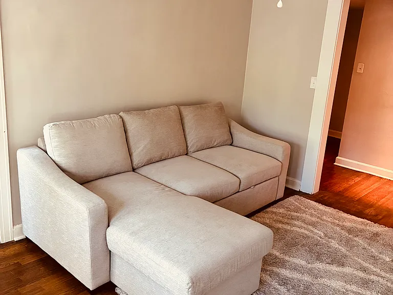 Living room with wide entrance to dining area