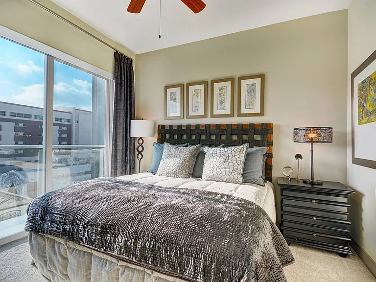 Each bedroom features a ceiling fan with decorative lighting