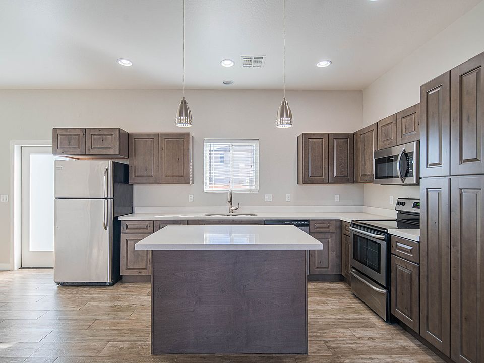 Open kitchen with stainless steel appliances