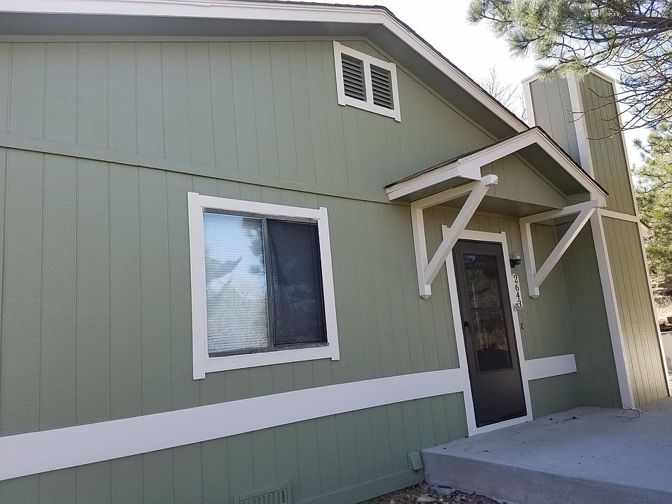 Front door facing open space and trails.