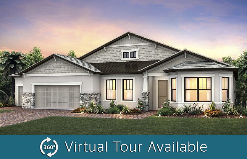 The Camelot, a one-story family home with a 3 car garage, shown with Home Exterior C2B