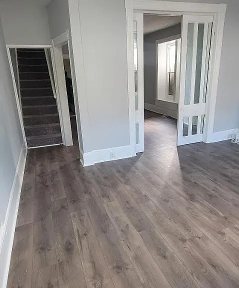 Front entrance opens up the to the living room area and hallway that leads to 2nd floor