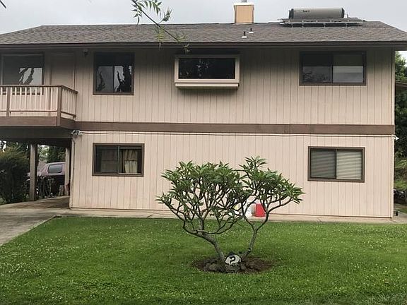 Side of house w/additional carport