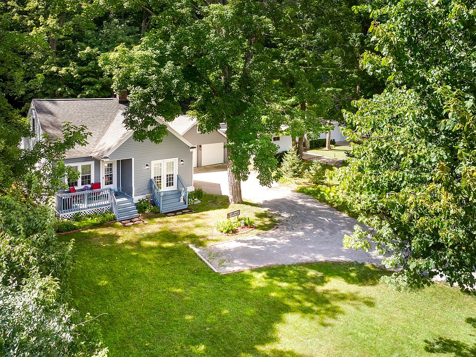 Cozy home on 1.8 acre lot with detatched garage.