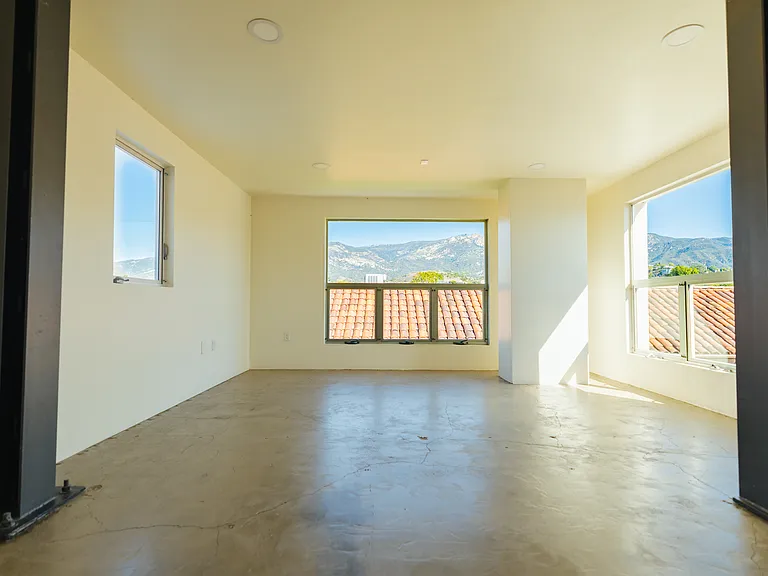 Upstairs living area and bedroom. Views of the mountains.