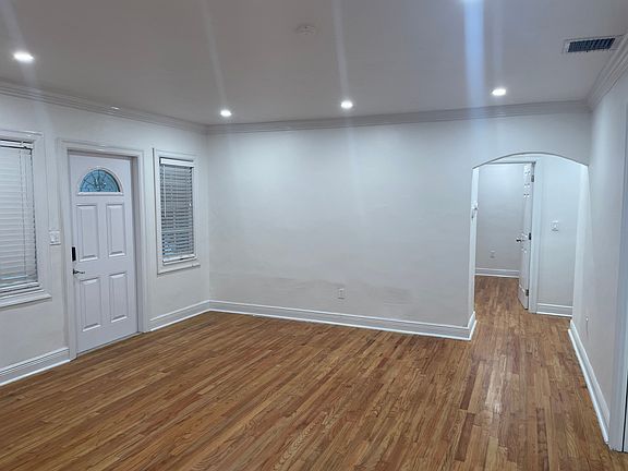 The Living Room-leads to the main hallway to bedrooms and bathroom, as well as the Florida room