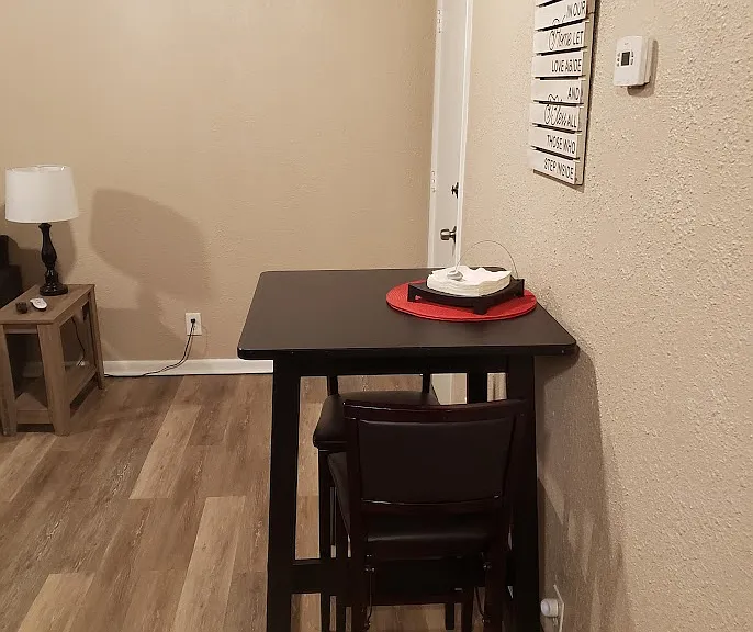 Dining area - Table can stay as it is perfect for the space but if unfurnished doesn't matter.