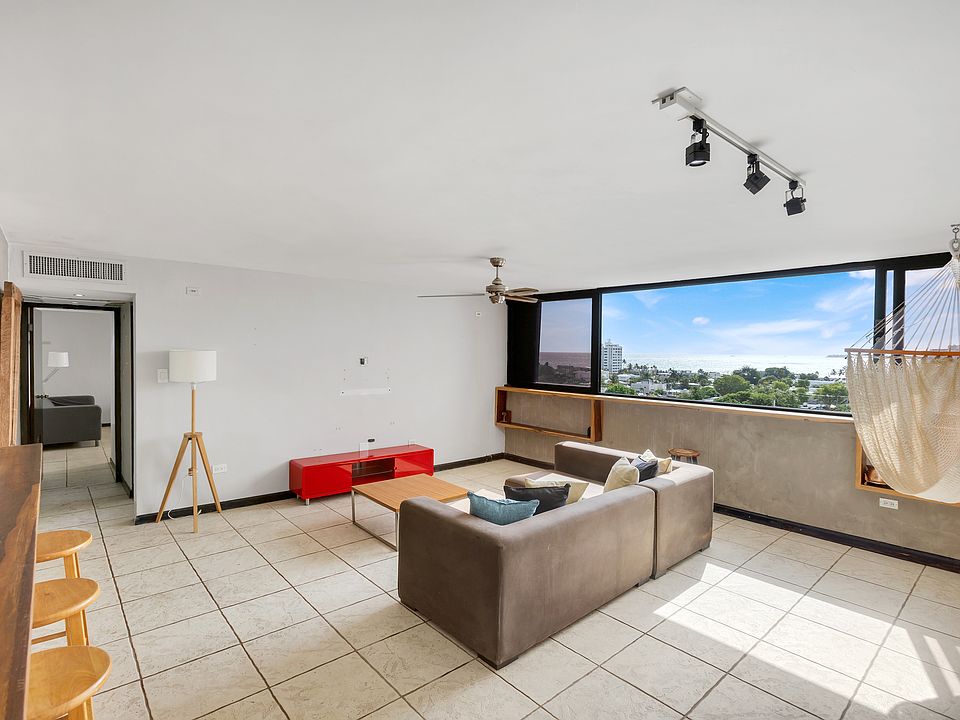 Living room with open kitchen.
