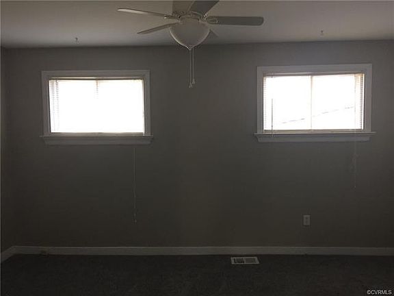 Master bedroom with walking closet, fan and half bath