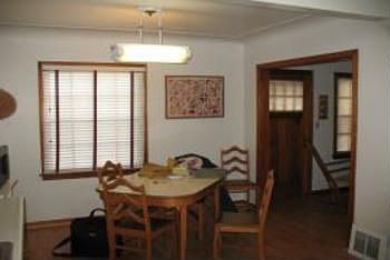 This is a view of the diningarea in the kitchen and the nice large window looking out across the fro