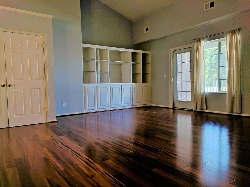 Huge vaulted ceilings and cherrywood floors w/deck!