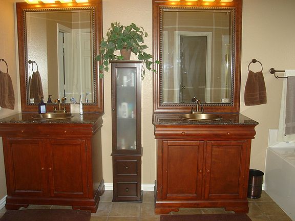 Master Bath - hardwood vanities w/ marble tops