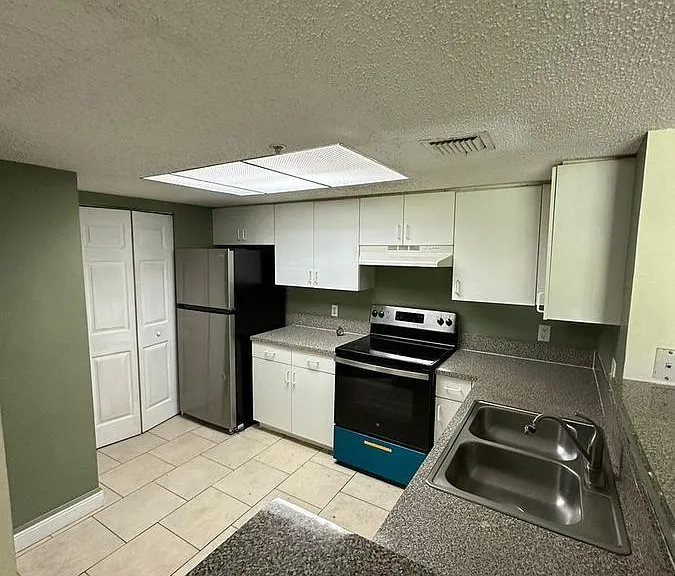 5005 Wiles Rd #102 — Photo 10