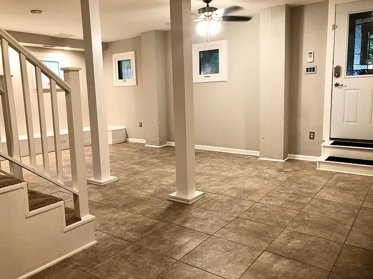 Open Concept Living Room with secure, private entrance.