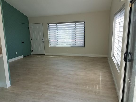 Living Room Area with modern wood accent wall.