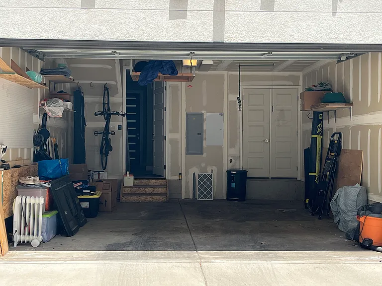 Garage for 2 cars with shelves
