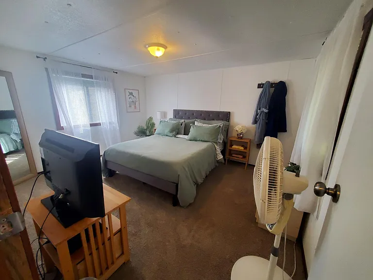 Larger bedroom.