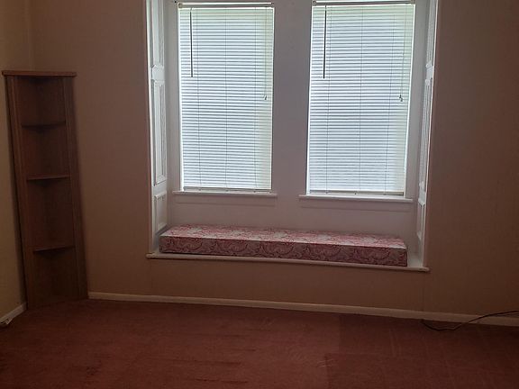 cute window seat in living room.