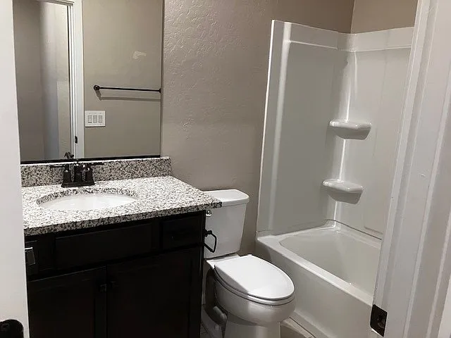 Additional bath serves the two bedrooms.