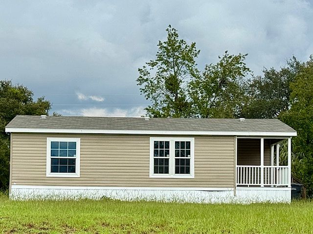 2/2 Mobile Home on 1/2 acre lot