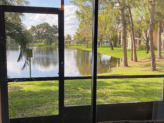 Porch with Lake + Pool View