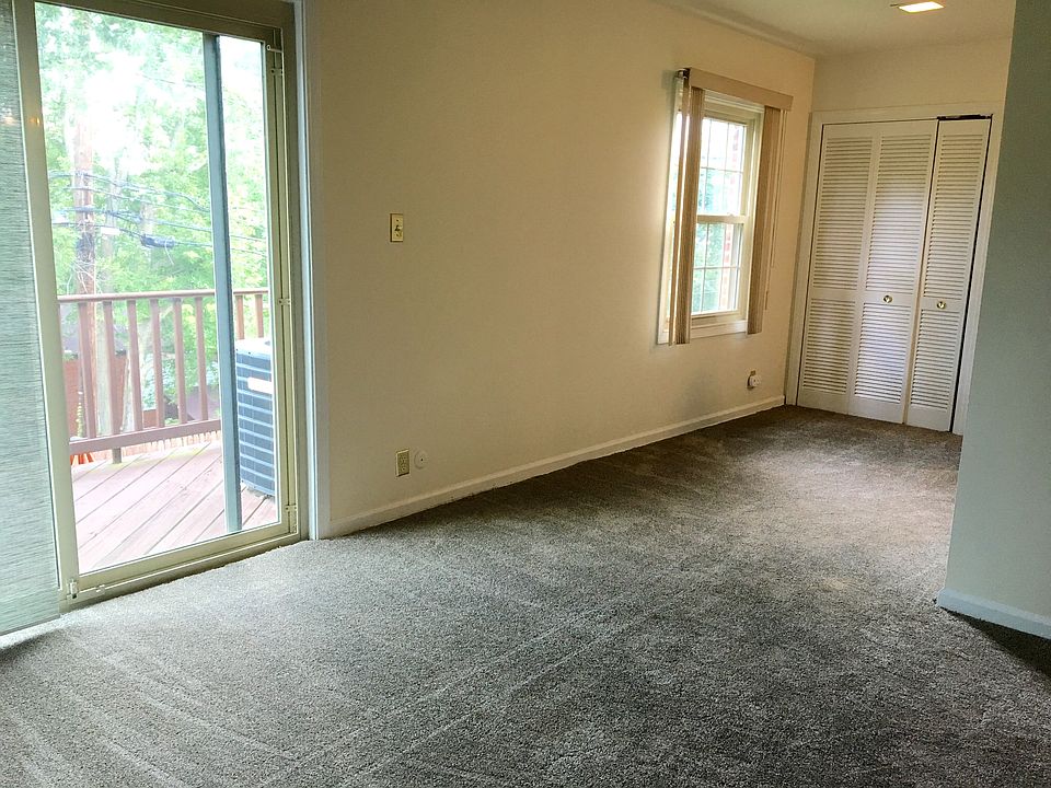 Another view of living room, leading into kitchen