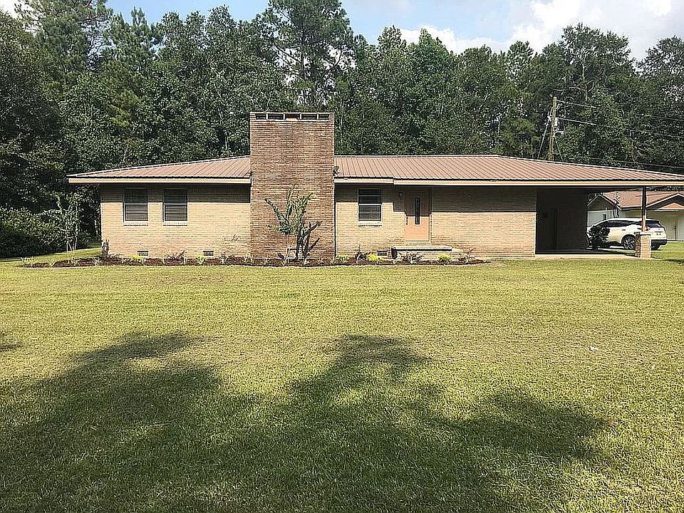 ~2.5 ac., main + guest house