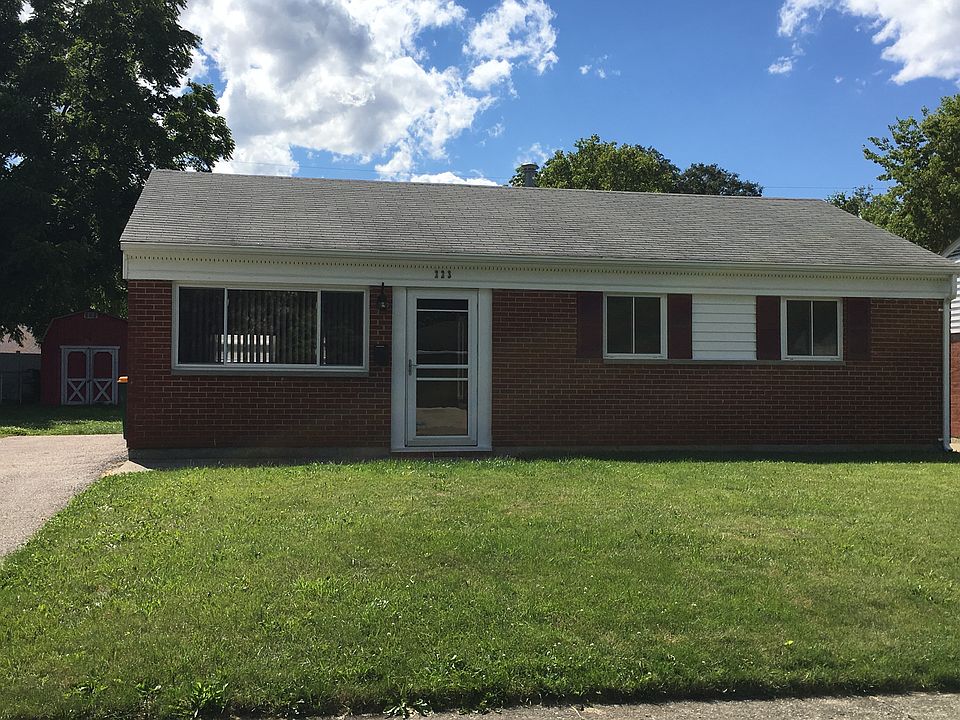 Outside of the house. 