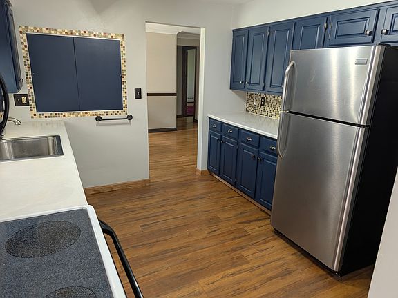 Kitchen with all appliances.