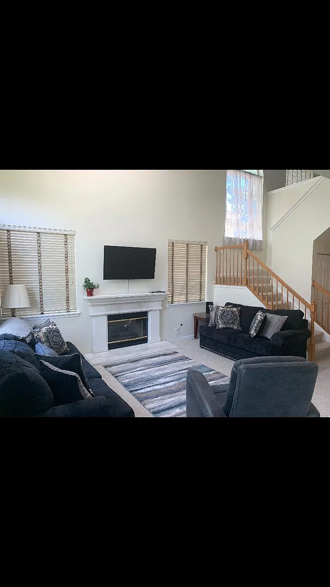 Living room with gas fire place. - 244 Sierra Pass Dr