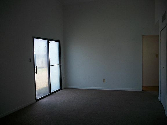 Photo of the living/dining area  taken from the entry.
