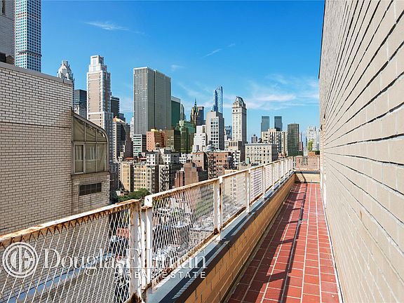 2nd image of 166 E 63rd St Penthouse B