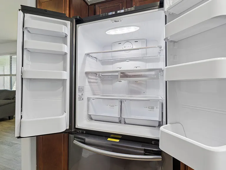 Gorgeous stainless steel fridge gives you ample storage