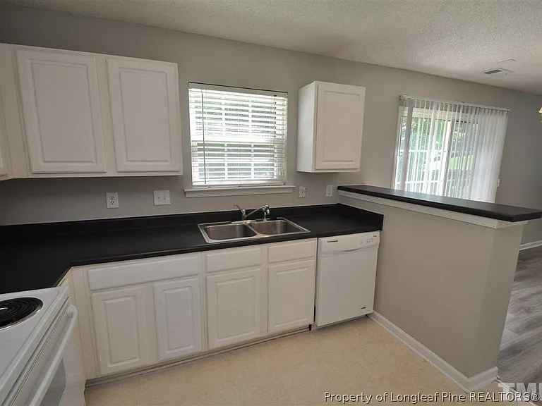 5909 Rivercliff Ct — Photo 9