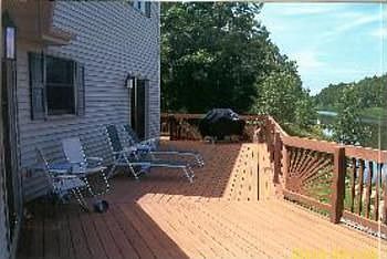 Part of the 12 x 44 deck. Doorwalls from living room and dining room lead to deck. Great place to re