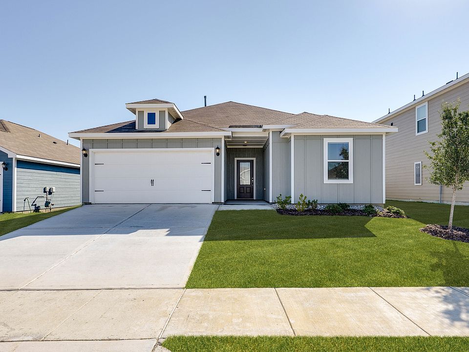 The Reed is a beautiful one-story, siding home.